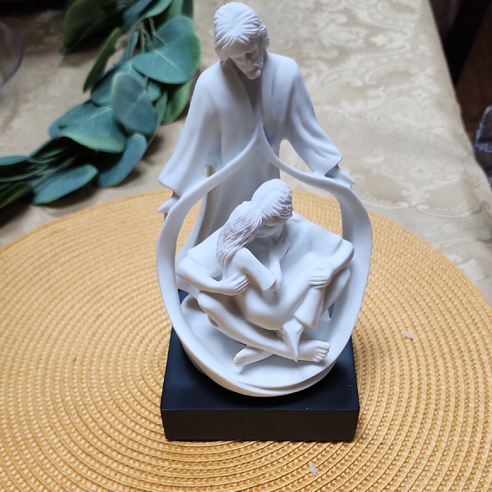 Elegant White Figurine Art Piece